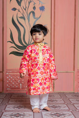 Vibrant printed kurti-sharara set and Vibrant printed kurta paired with classic white pyjama