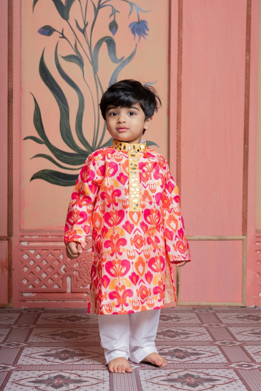 Vibrant printed kurti - sharara set and Vibrant printed kurta paired with classic white pyjama - Kirti Agarwal