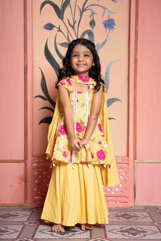 Yellow floral kurta with pre - stitched dhoti & floral peplum set with flared Palazzo and tassel dupatta - Kirti Agarwal
