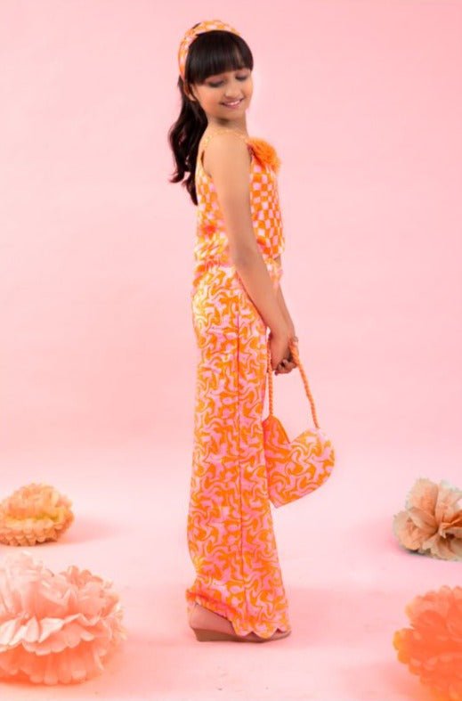 Sleeveless Orange check print Jumpsuit with stylish flowers on top - Kirti Agarwal