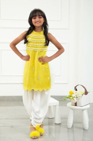 Yellow Chanderi cowrie shell lace work on top with Dhoti - Kirti Agarwal