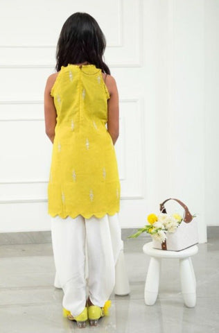 Yellow Chanderi cowrie shell lace work on top with Dhoti - Kirti Agarwal
